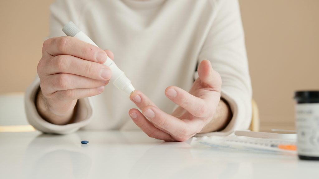 Person checking their blood sugar